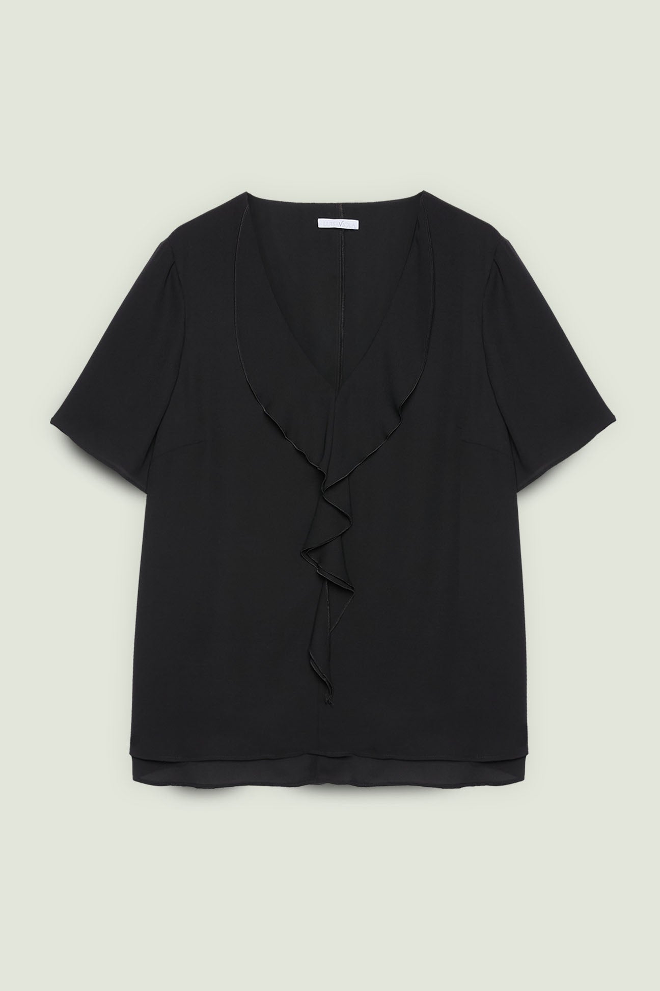 BLUSA CON VOLANT