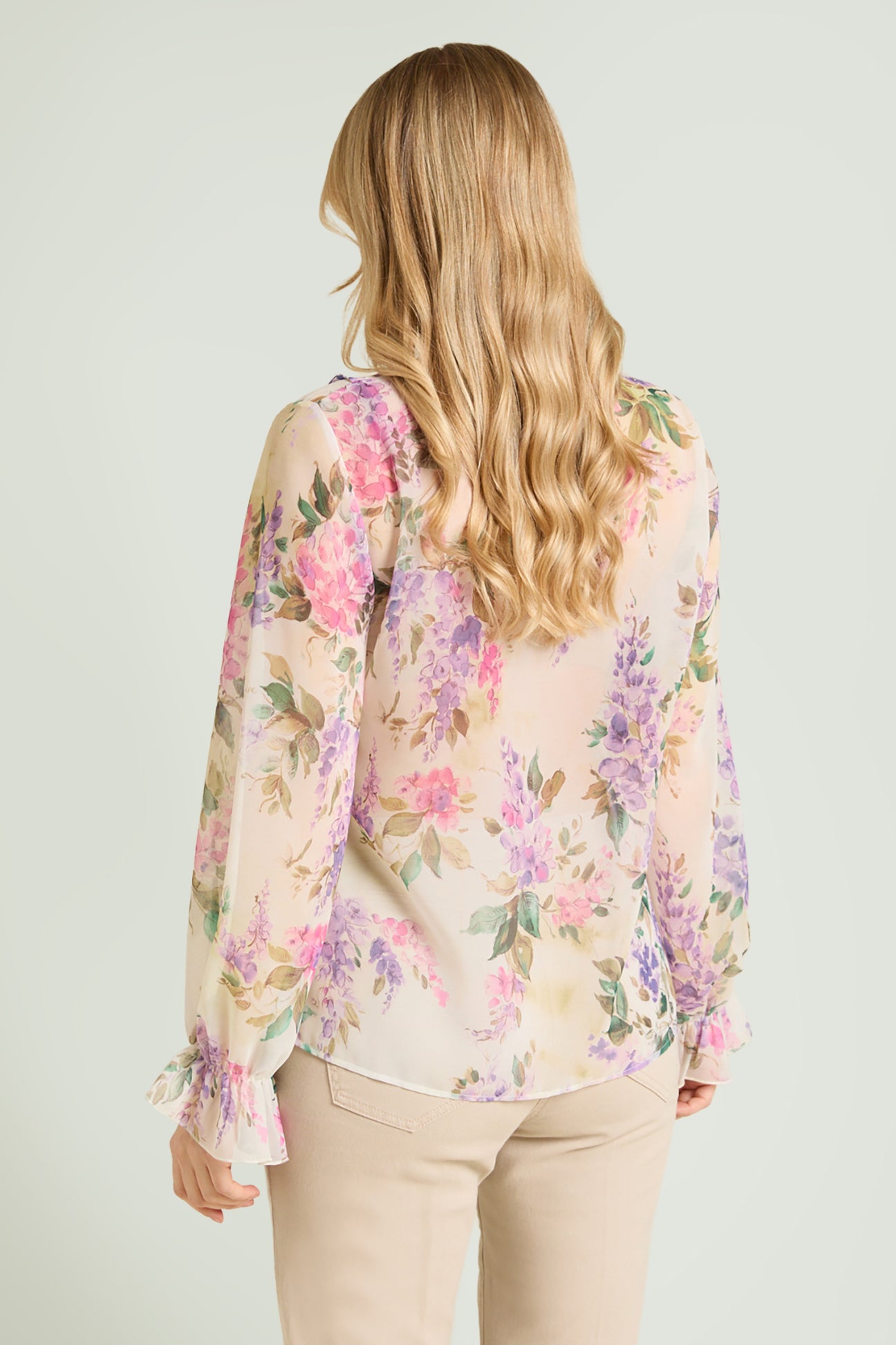 BLUSA STAMPATA CON VOLANT