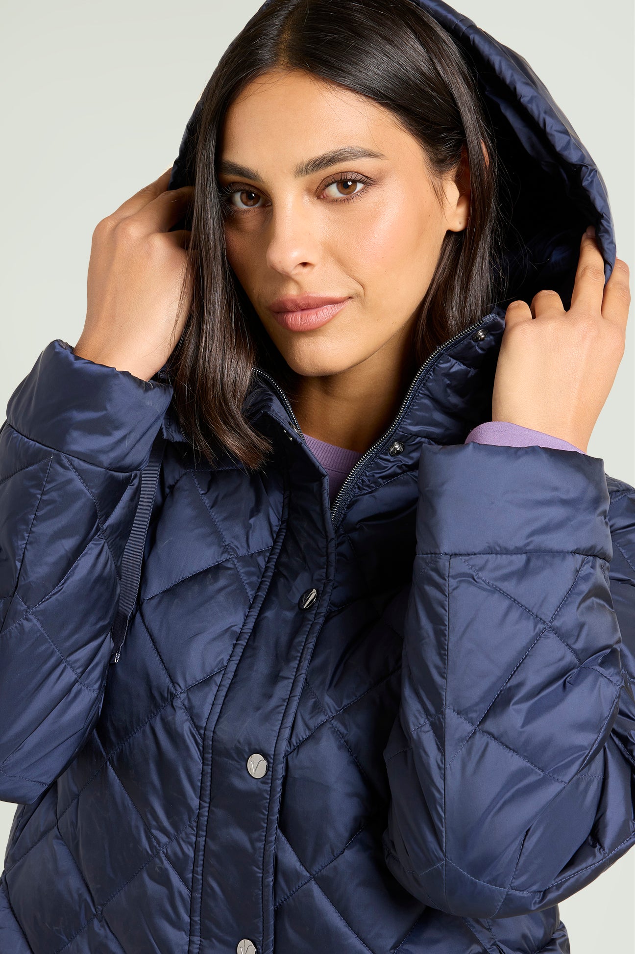 PIUMINO CON CAPPUCCIO STACCABILE