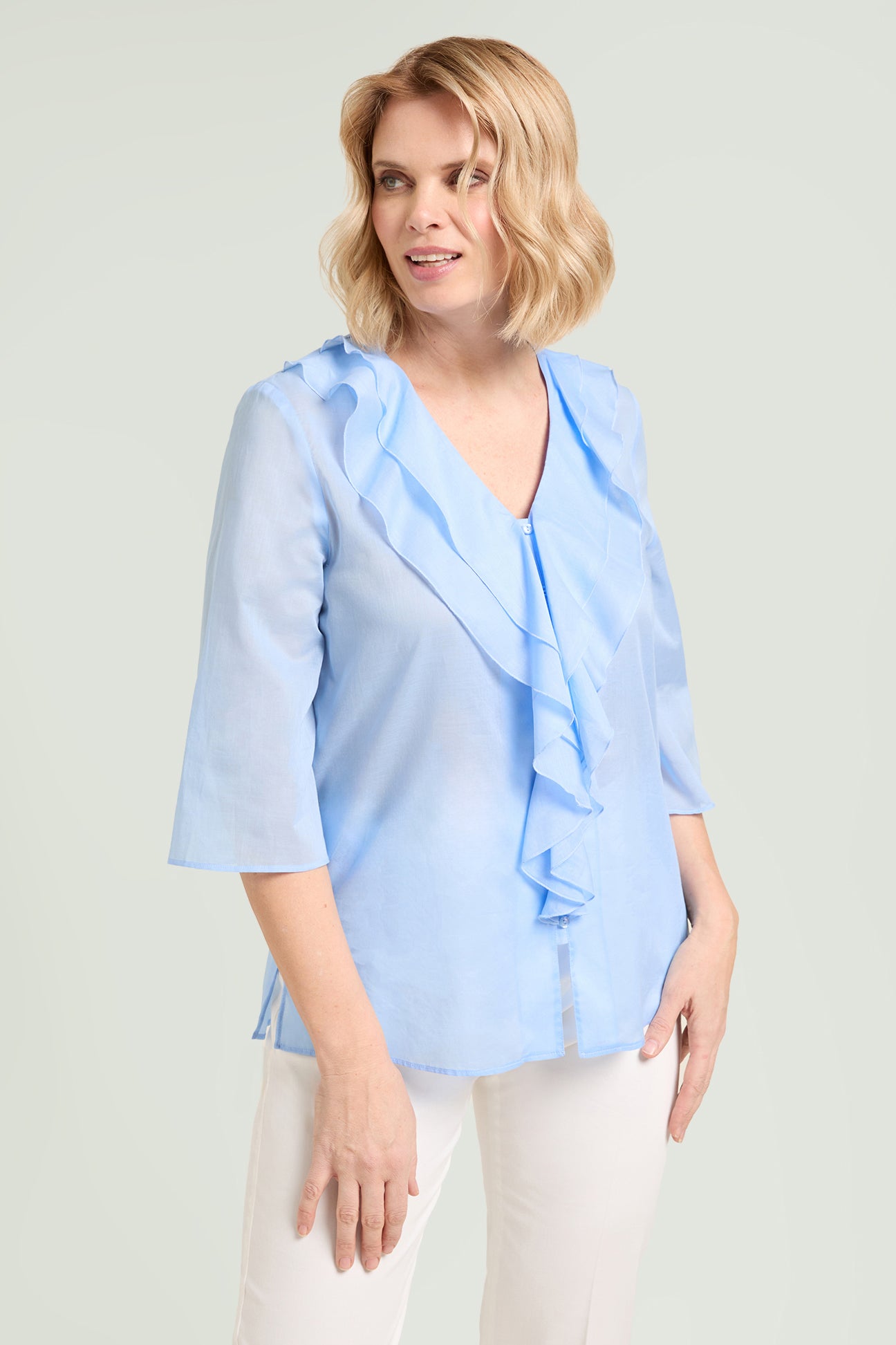 CAMICIA CON VOLANT IN MUSSOLA