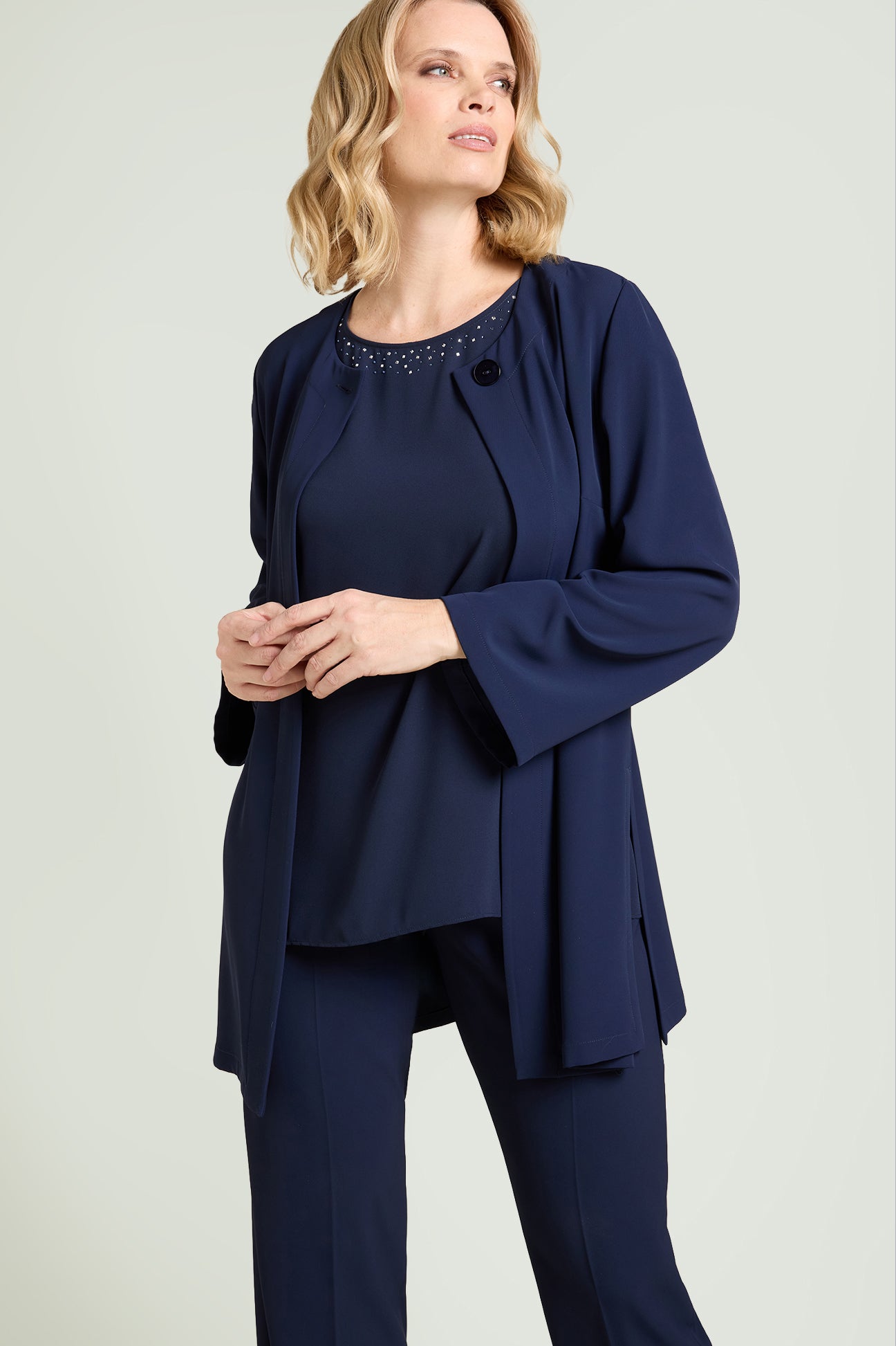 TOP IN DOPPIA GEORGETTE CON PUNTI LUCE