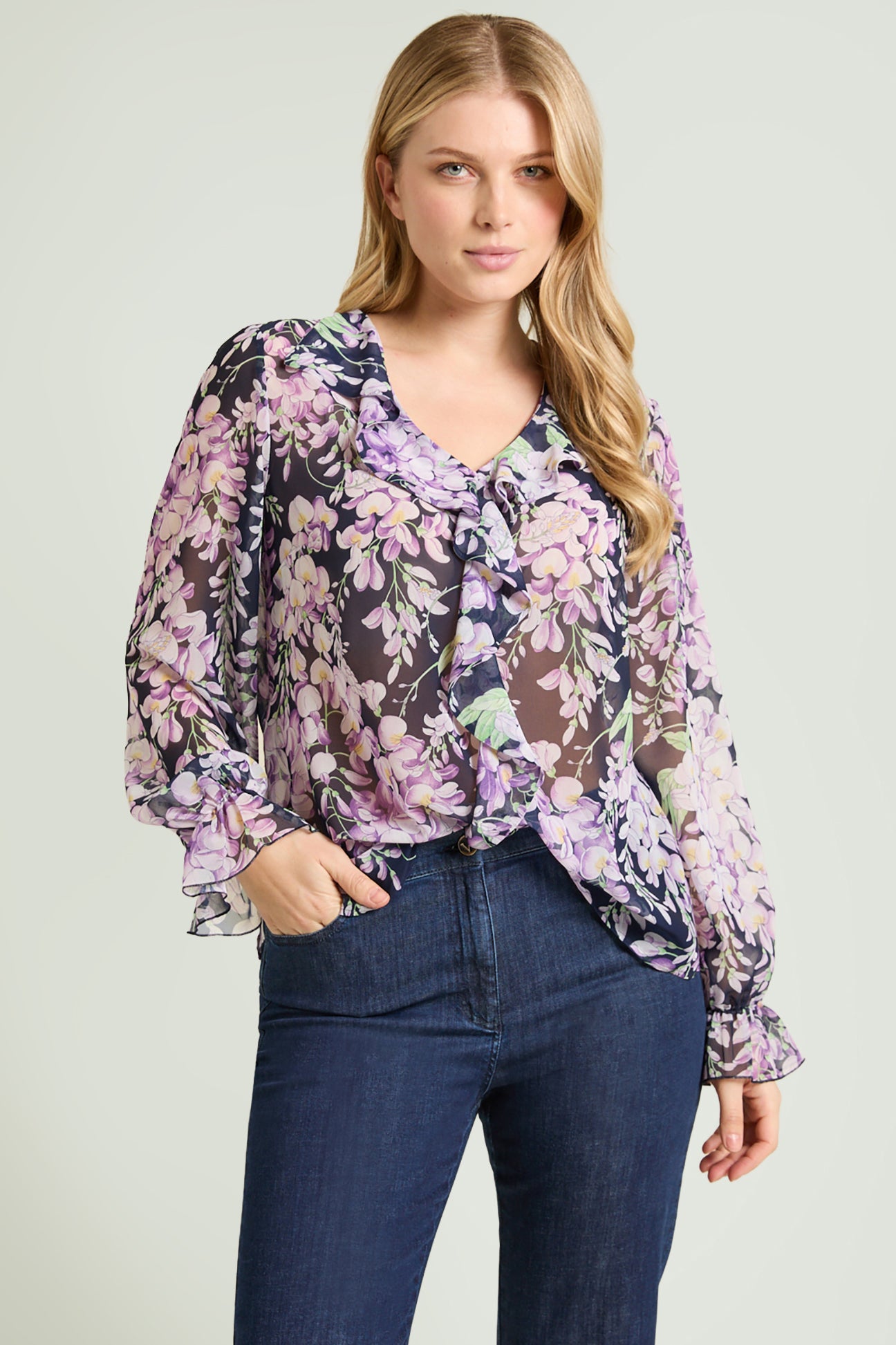 BLUSA STAMPATA CON VOLANT