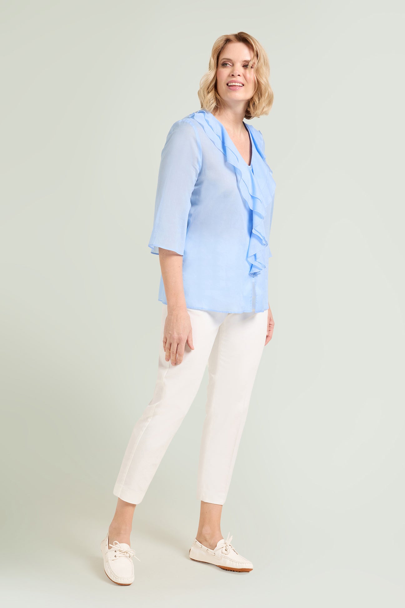CAMICIA CON VOLANT IN MUSSOLA