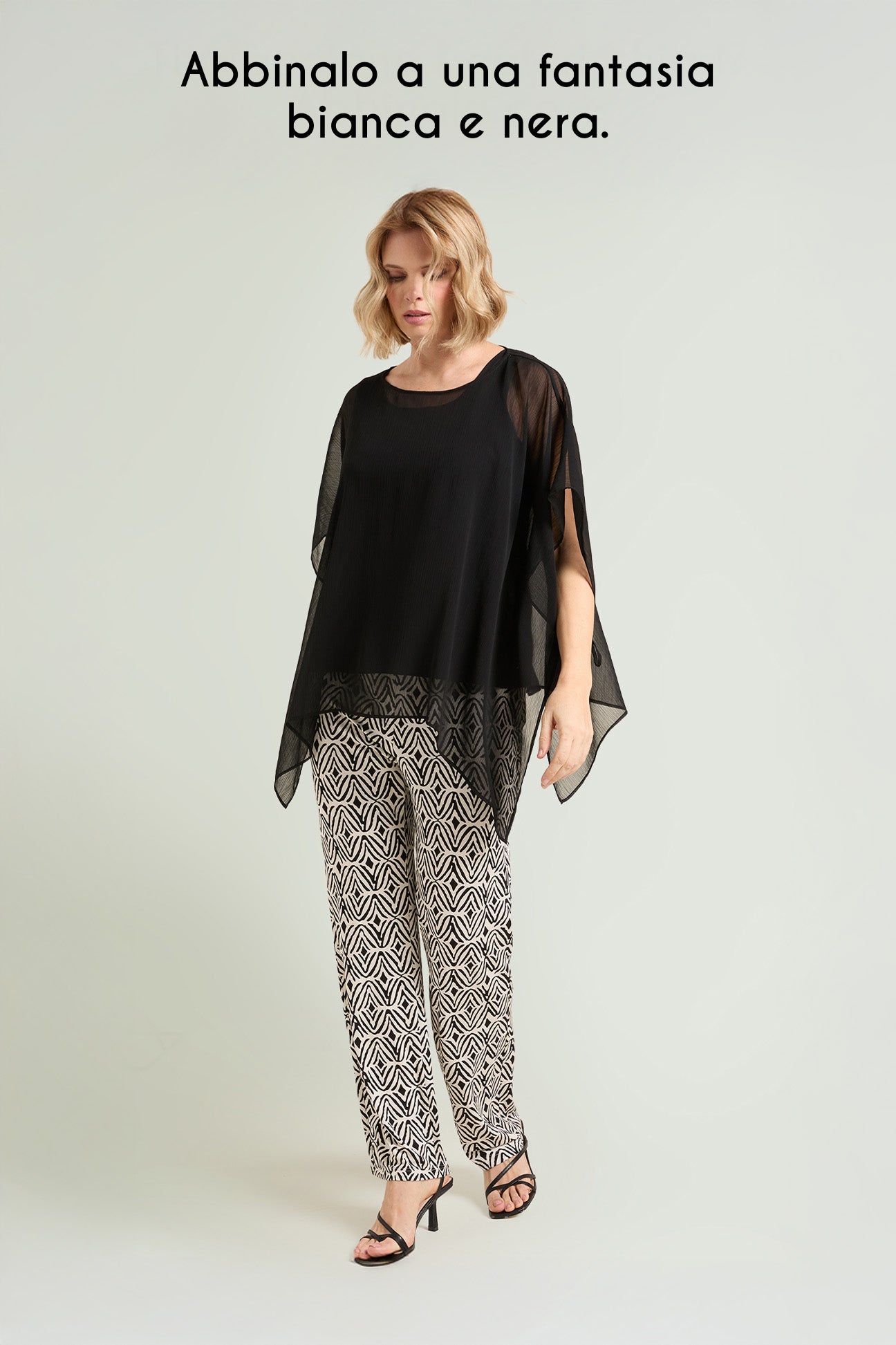 PONCHO IN CREPONNE CON TOP IN JERSEY
