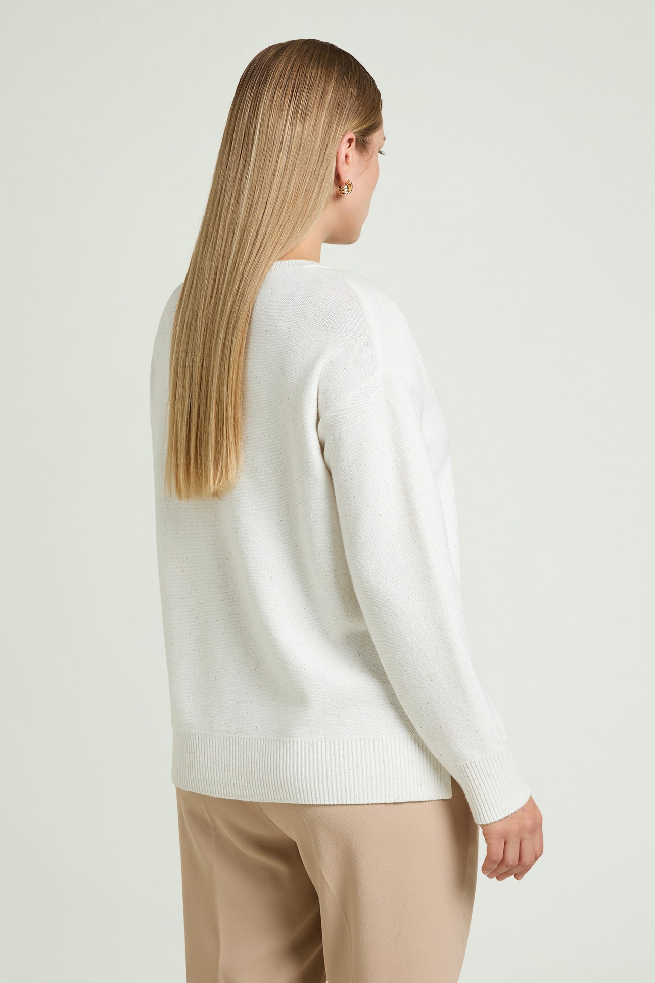 MAGLIA A "V" CON PUNTI LUCE