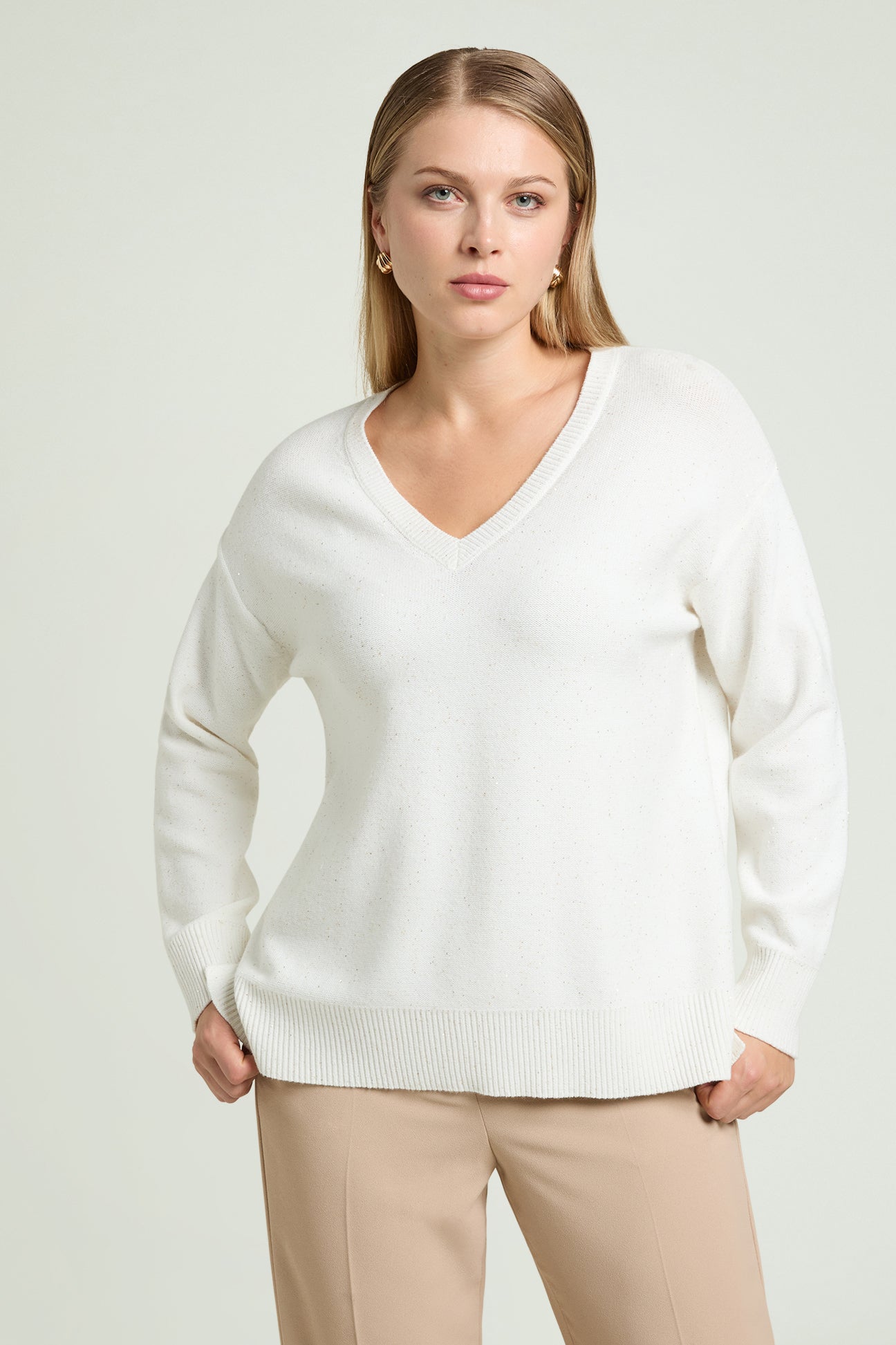 MAGLIA A "V" CON PUNTI LUCE