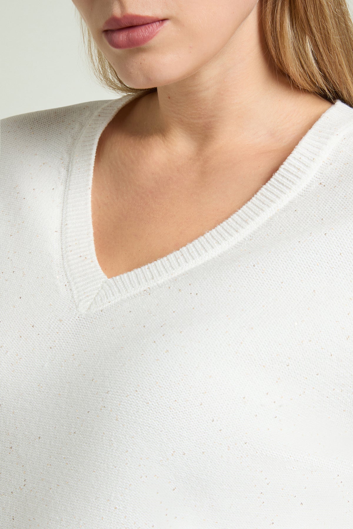 MAGLIA A "V" CON PUNTI LUCE