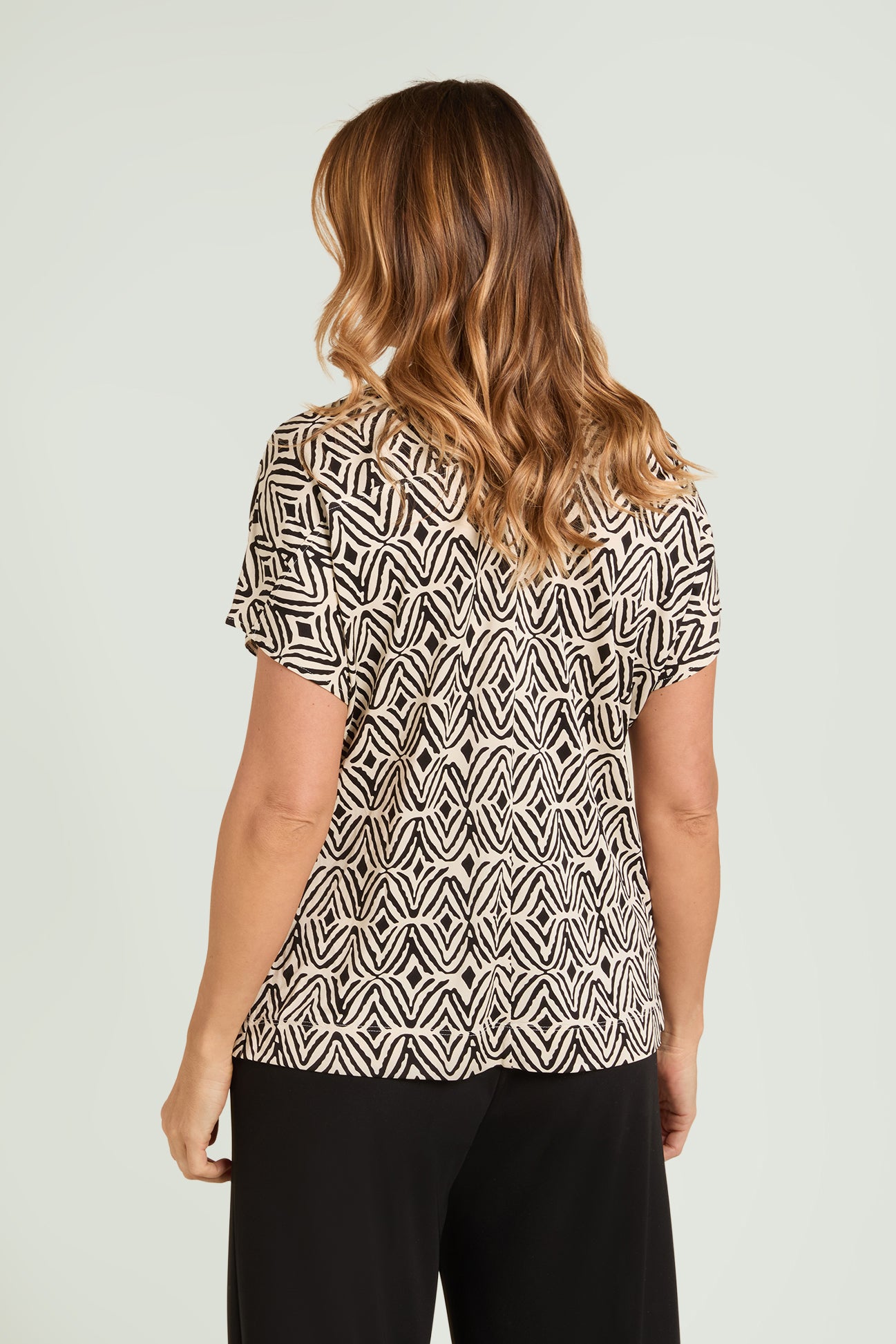 BLUSA STAMPATA IN JERSEY PIQUET