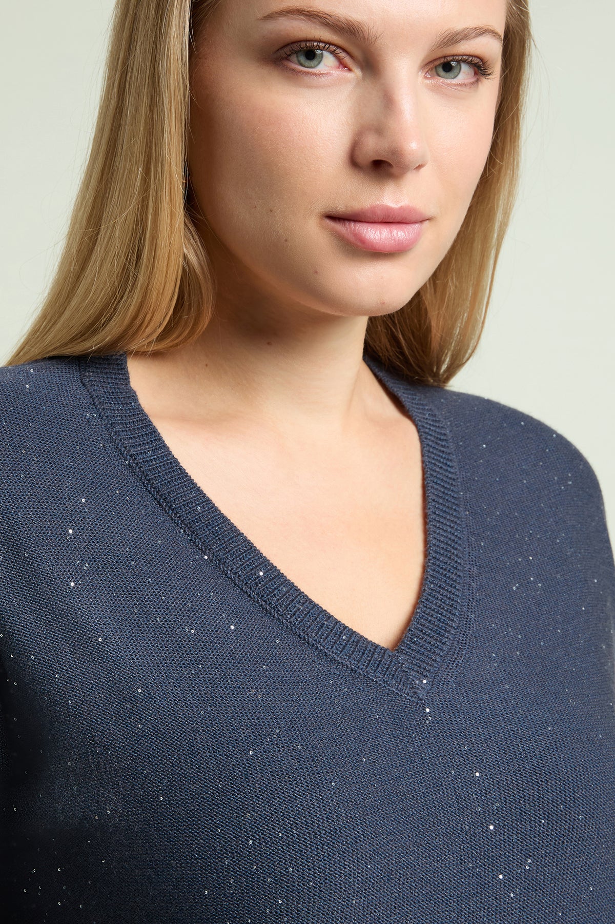 MAGLIA A "V" CON PUNTI LUCE